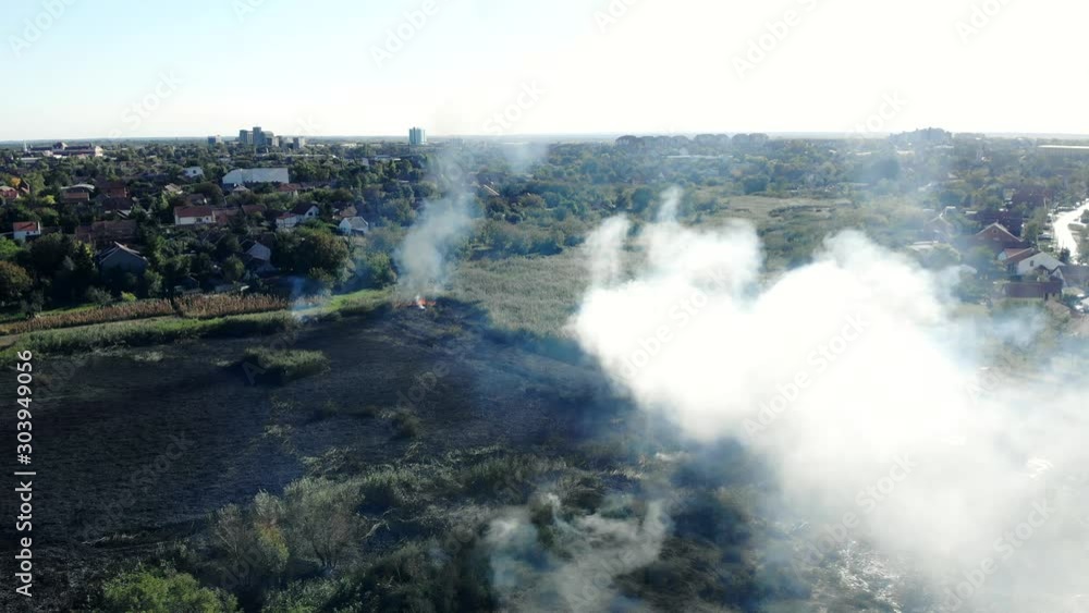 Burn smoking fire in the suburb area aerial Burn smoking fire in the suburb area aerial
