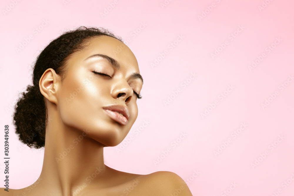 African American skincare models portrait. Beauty spa treatment concept.Young girl posing with closed eyes against pink background - obrazy, fototapety, plakaty 