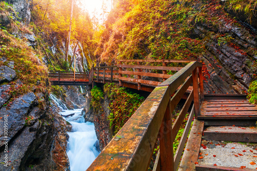 Fotografia, Obraz Beautiful Wimbachklamm gorge with wooden path in autumn colors, Ramsau bei Berch