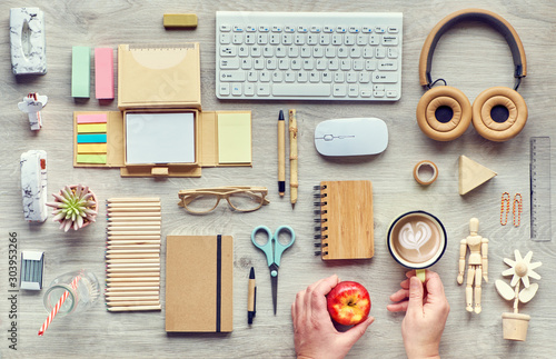 Concept flat lay with modern office supplies from eco friendly sustainable materials, craft paper, bamboo, and wood. Organize workspace routines without single use plastic to reduce waste.