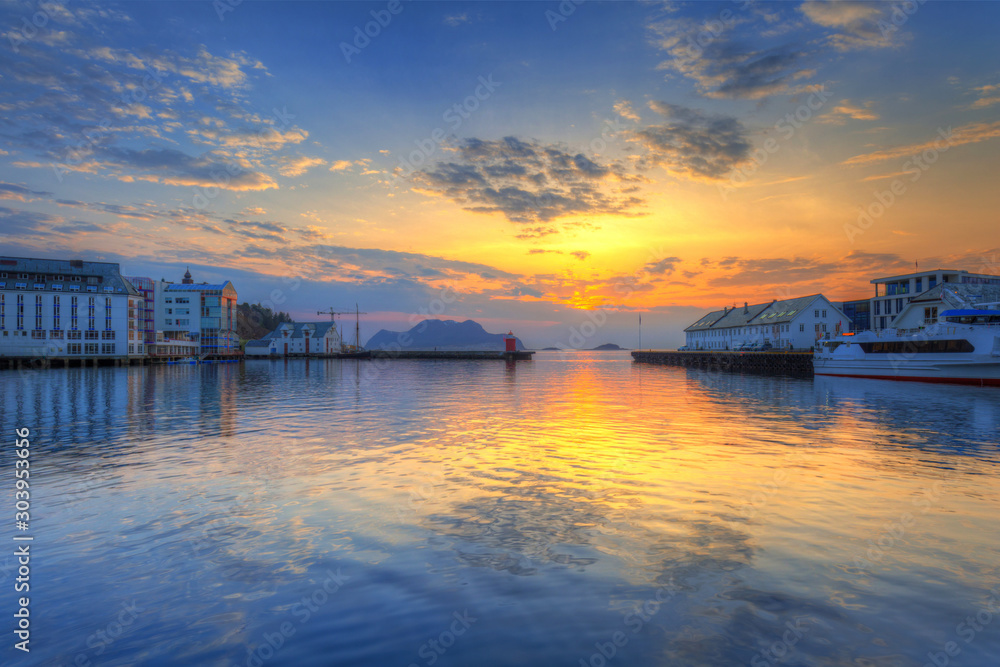 Beautiful sunset in the harbor of Alesund town, Norway