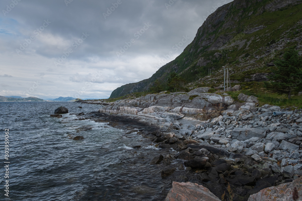 Coast in Alnes, Godoy island, Norway. July 2019 Coast in Alnes, Godoy island, Norway. July 2019
