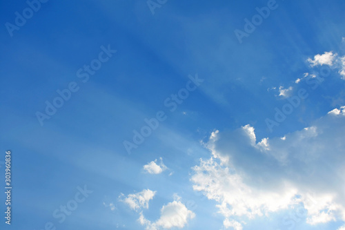 Blue sky and clouds with sun shine background. © Aonprom Photo
