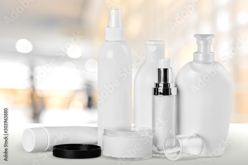 Cosmetic containers isolated on background