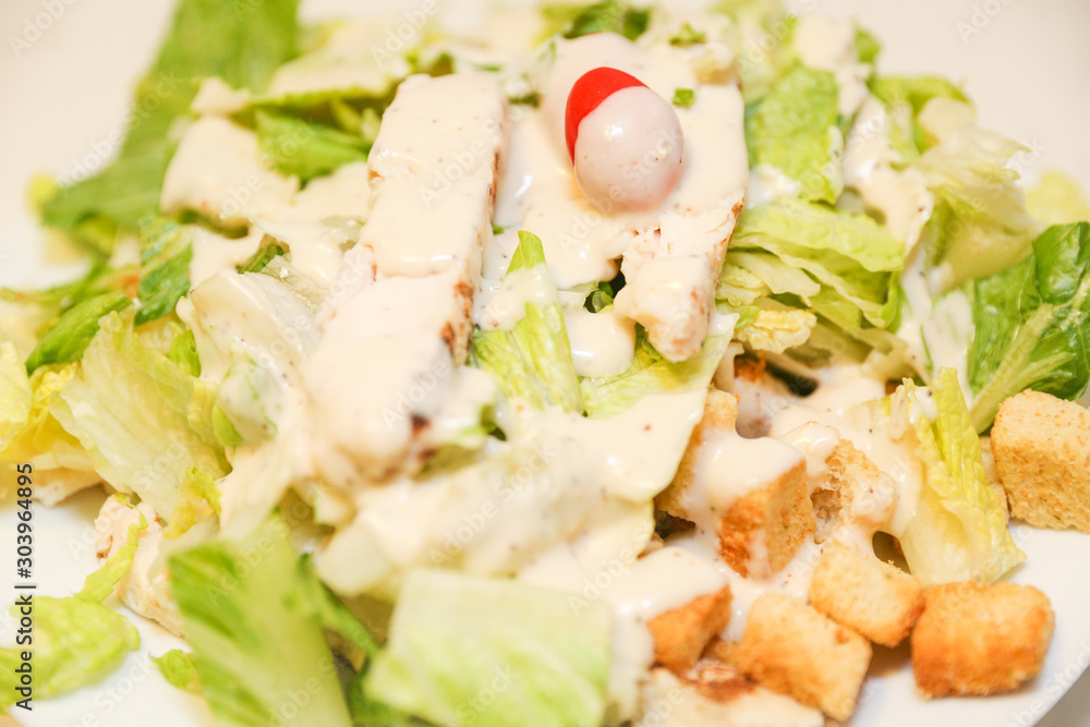 Fresh salad with chicken breast, arugula and tomato. Top view - Image Fresh salad with chicken breast, arugula and tomato. Top view - Image