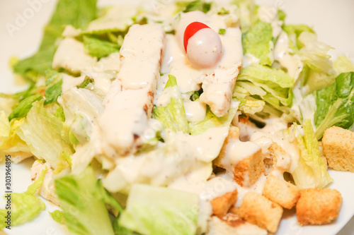 Fresh salad with chicken breast, arugula and tomato. Top view - Image