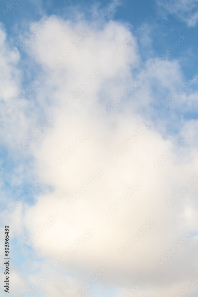 Blue sky with white clouds. Cloud background with color gradient and grunge texture. Blue sky with white clouds. Cloud background with color gradient and grunge texture.