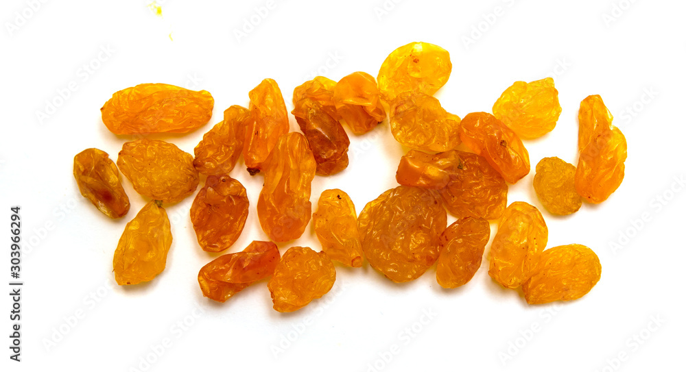 Dried raisins yellow raisins on a white background. Dried raisins yellow raisins on a white background.