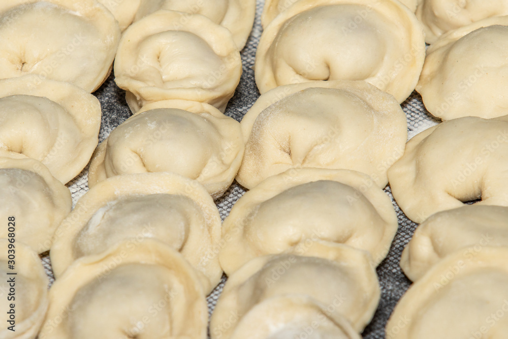 We cook dumplings, minced meat, dough, food. We cook dumplings, minced meat, dough, food.