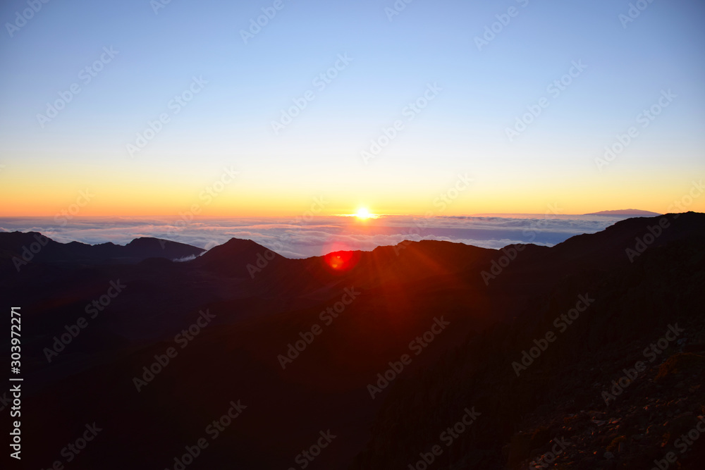 Sunset on Haleakala Volcano Mountain in Maui, Hawaii Sunset on Haleakala Volcano Mountain in Maui, Hawaii
