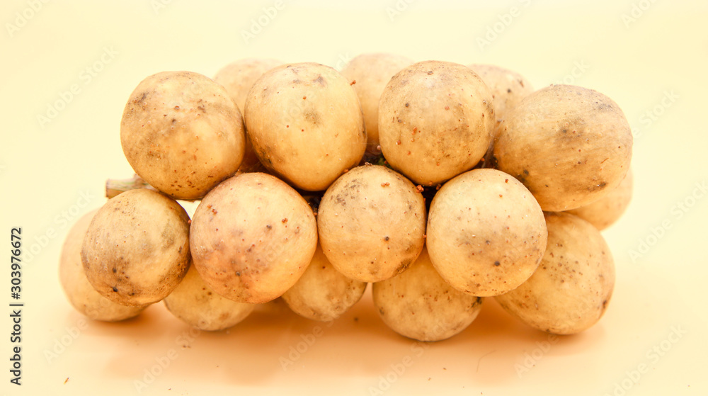 Wollongong fresh fruit of Thailand on yellow background Wollongong fresh fruit of Thailand on yellow background