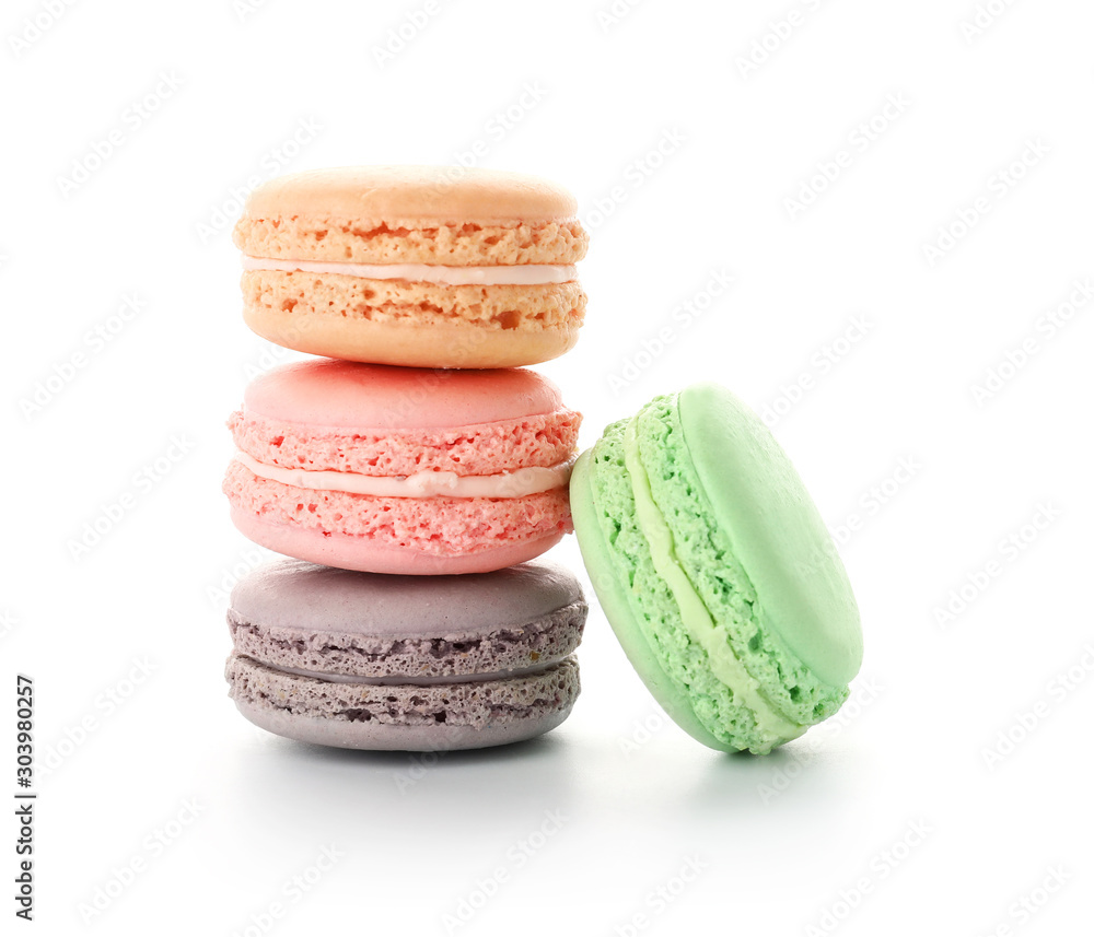 Fototapeta premium Different tasty macarons on white background