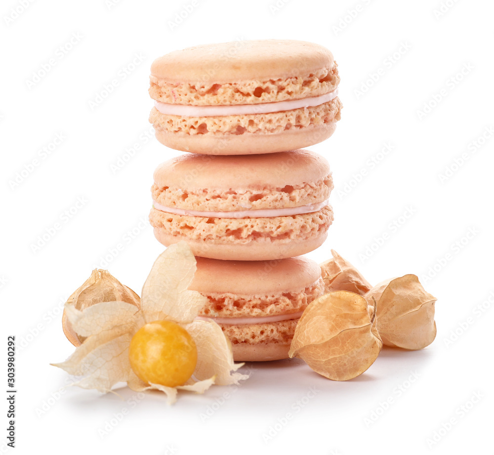 Tasty macarons with physalis on white background Tasty macarons with physalis on white background