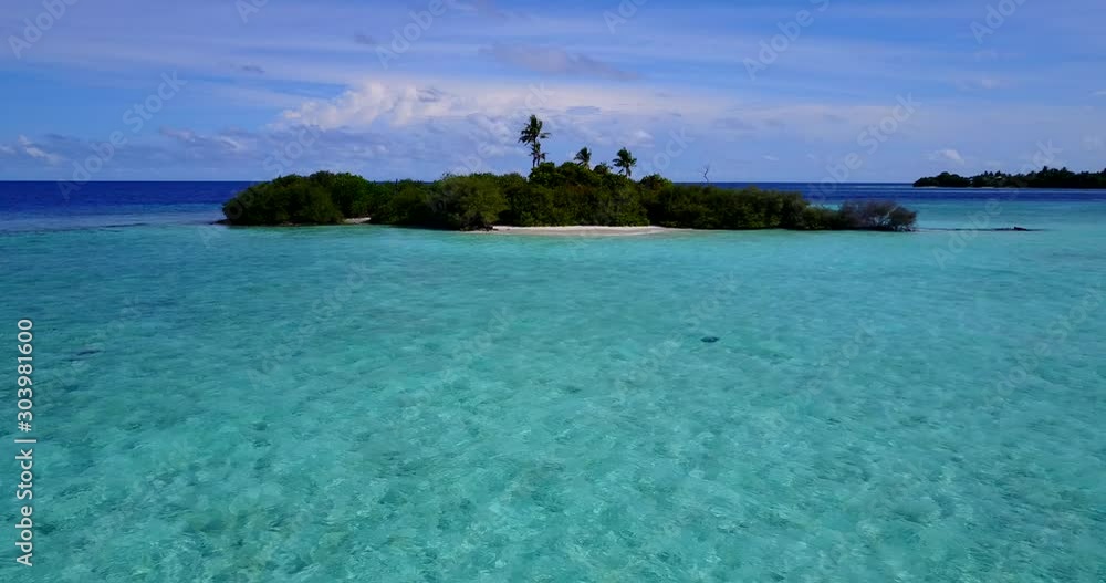 Paradise tropical islands with lush vegetation and small pristine beaches surrounded by crystal emerald clear water on a bright sky with colorful clouds in Bora bora Paradise tropical islands with lush vegetation and small pristine beaches surrounded by crystal emerald clear water on a bright sky with colorful clouds in Bora bora