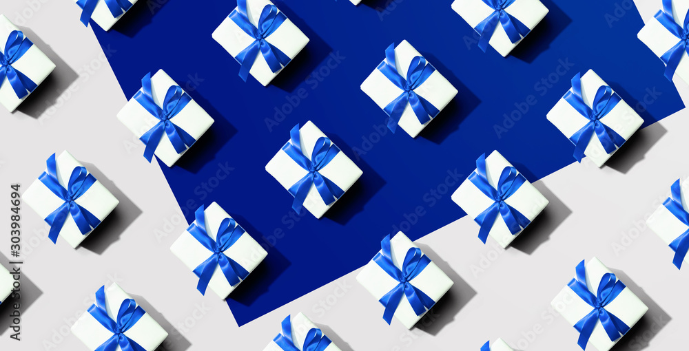 Obraz premium Collection of gift boxes with blue ribbons - flat lay