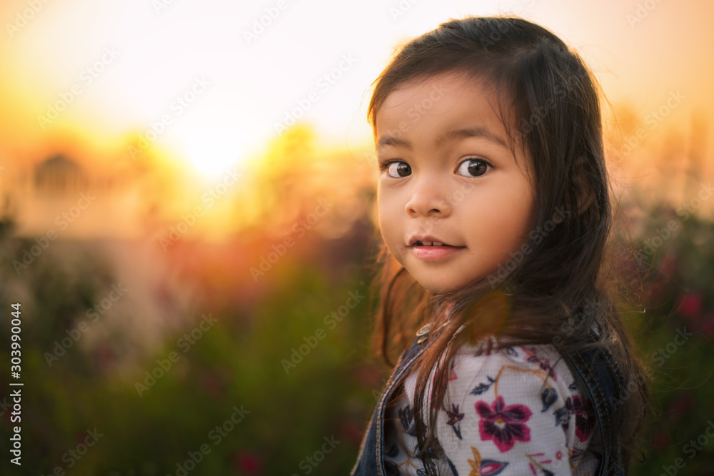 Cute Little Girl Admiring a Sunset Cute Little Girl Admiring a Sunset