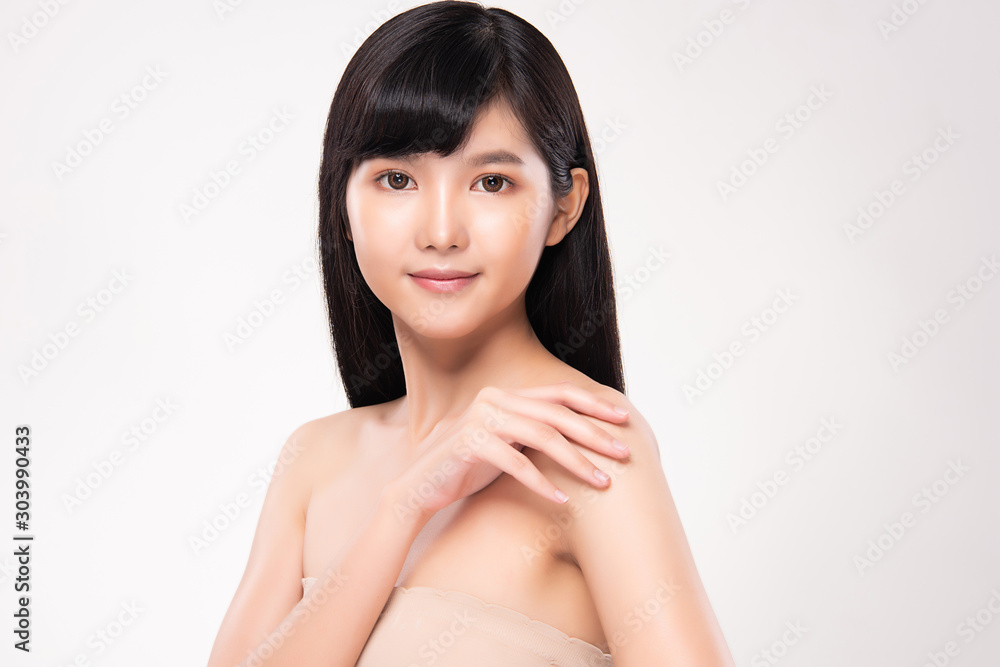 Beautiful Young Asian Woman hand Touching on Shoulder. Clean and Fresh skin, isolated on white background, Beauty Cosmetology Concept, Beautiful Young Asian Woman hand Touching on Shoulder. Clean and Fresh skin, isolated on white background, Beauty Cosmetology Concept,