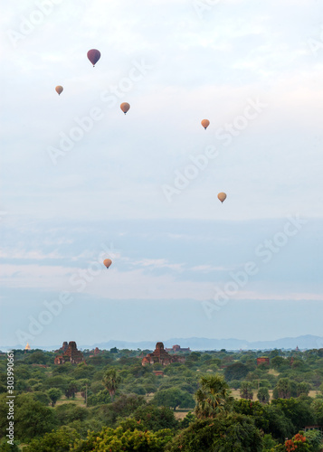 Hot air balloons clouding the historic horizon. Bagan’s balloons have become an iconic symbol of the region, and have carried many travelers on soaring adventures of Bagan, Myanmar