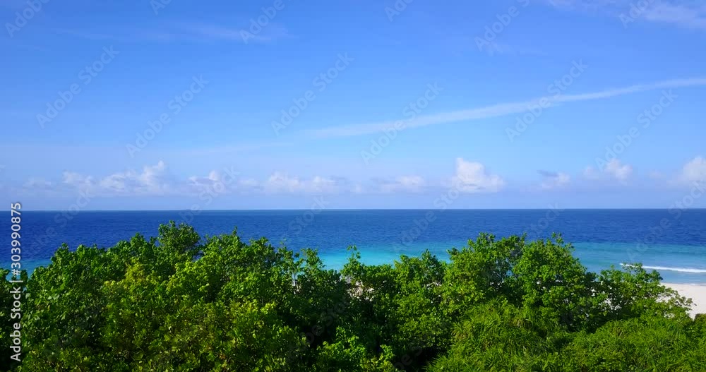 Runaway Bay Beach, North Coast, Jamaica, Caribbean, West Indies - Stunning Scenery Of Blue Sea And Green Trees Captured On A Bright Sunny Weather - Panoramic Shot Runaway Bay Beach, North Coast, Jamaica, Caribbean, West Indies - Stunning Scenery Of Blue Sea And Green Trees Captured On A Bright Sunny Weather - Panoramic Shot