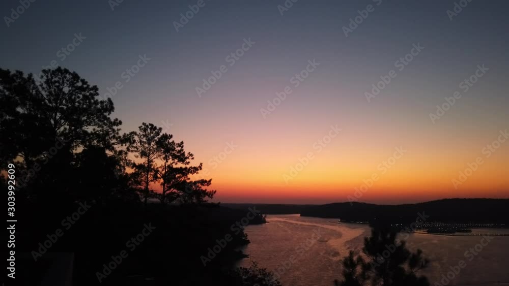 Sunrise over pretty lake i n the early morning, colorful orange sun rise. Sunrise over pretty lake i n the early morning, colorful orange sun rise.