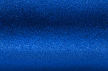 Ultramarine blue metallic glitter background for elegance rich luxury holiday design.