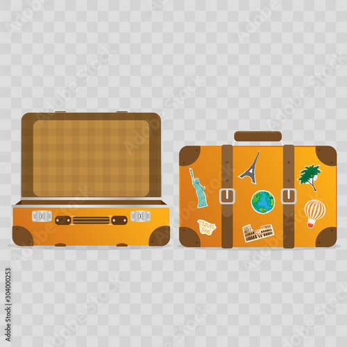 Opened old suitcase. Closed old travel suitcase. Suitcase with stickers of world sights. Travel stickers on retro luggage.  Yellow suitcase for tourism