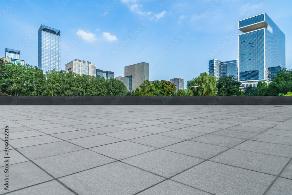 Fototapeta premium Panoramic skyline and buildings with empty square floor.