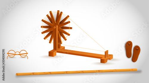 Gandhiji used tool like as wooden stick with spinning wheel, eyeglasses and paduka (khadau) on white background.