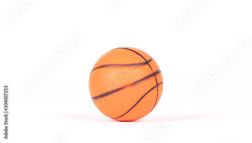 Single small rubber toy in form of basketball