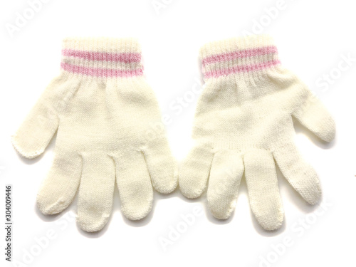 Gloves for children isolated on a white background. Children's clothing for the winter. Gloves for the smallest. Warm mittens.