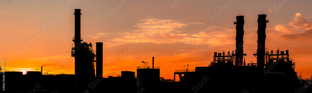 Gas turbine electrical power plant. Energy for support factory in industrial estate. Natural gas tank. Small gas power plant. Power plant using natural gas for fuel. Green energy. Dramatic sunset sky. Gas turbine electrical power plant. Energy for support factory in industrial estate. Natural gas tank. Small gas power plant. Power plant using natural gas for fuel. Green energy. Dramatic sunset sky.