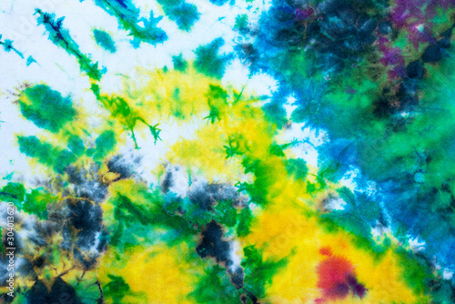 tie dye pattern hand dyed on cotton fabric abstract texture background.