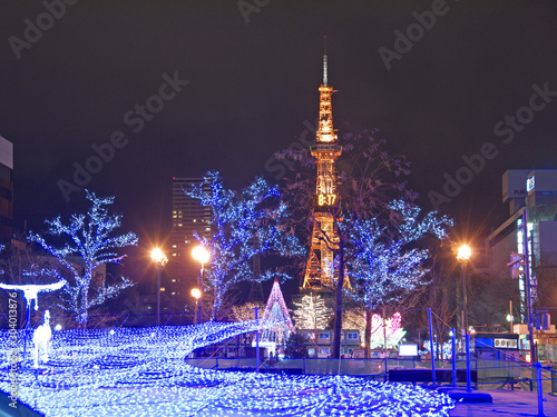 фотографія Illuminated Sapporo Tv tower and central park in the new year night