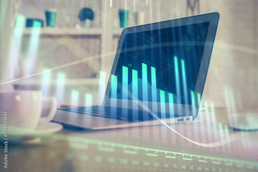 Stock market graph on background with desk and personal computer. Multi exposure. Concept of financial analysis. Stock market graph on background with desk and personal computer. Multi exposure. Concept of financial analysis.