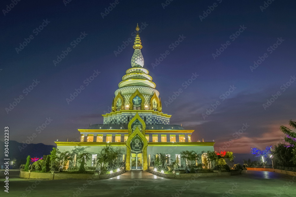 Fototapeta premium view morning of Crystal Pagoda or Chedi Kaew with blue sky background, Wat Tha Ton, Tha Ton, Fang, Chiang Mai, northern of Thailand.