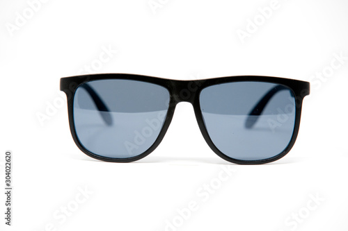 black sunglasses isolated over the white background