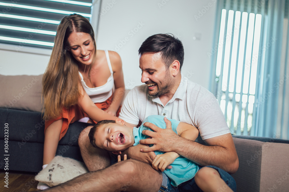 Young family being playful at home Young family being playful at home