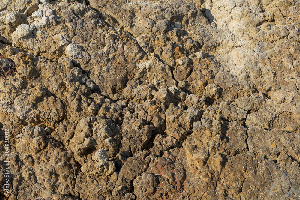 Dark gray lumpy surface of the earth Dark gray lumpy surface of the earth