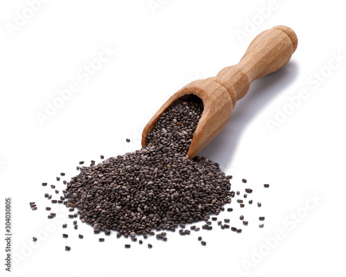 Macro depth of field Chia seeds in a wooden scoop isolated on white background