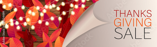 Thanksgiving sale banner, website header or newsletter cover. Red and orange fall leaves and glowing lights garland under peeling off paper. Realistic vector illustration with lettering.