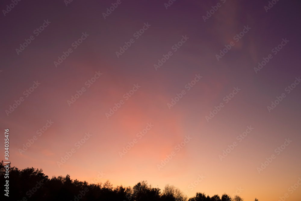 Autumn sunset sky at blue hour