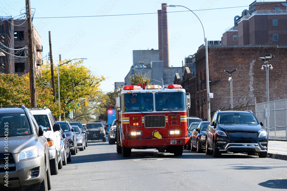 Fast fire engine in Manhattan, New York City. Fast fire engine in Manhattan, New York City.