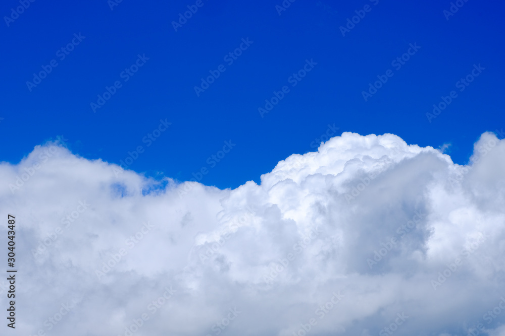 Beautiful blue sky with white gorgeous fluffy cloudy flowing with the wind Beautiful blue sky with white gorgeous fluffy cloudy flowing with the wind