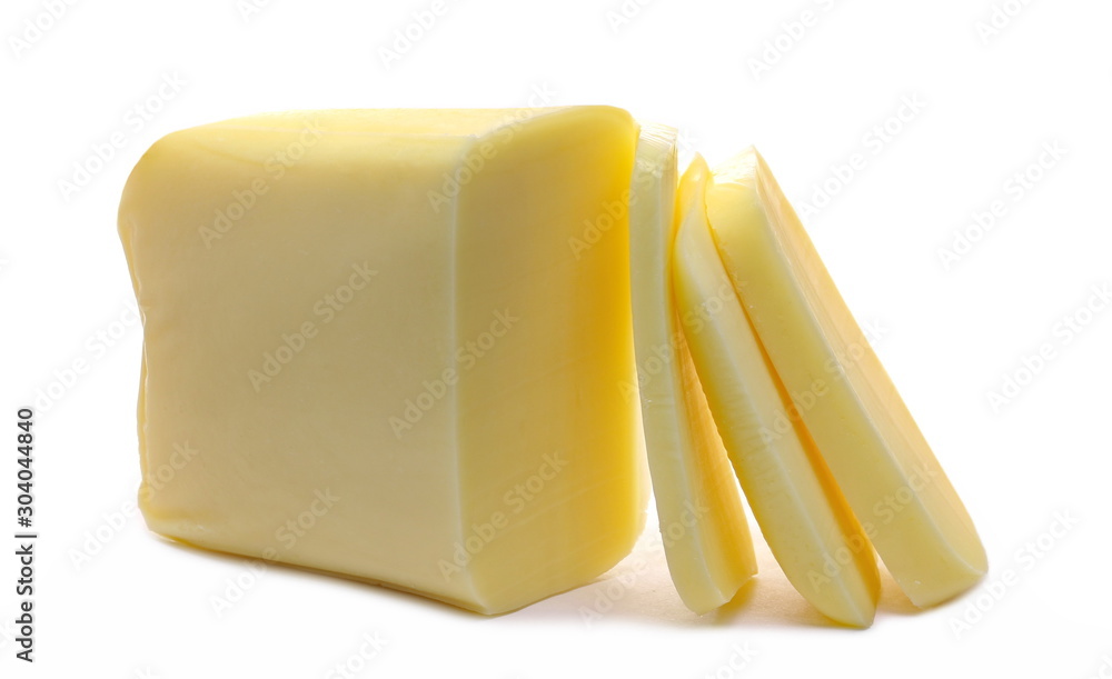 Cheese block with slices isolated on white background
