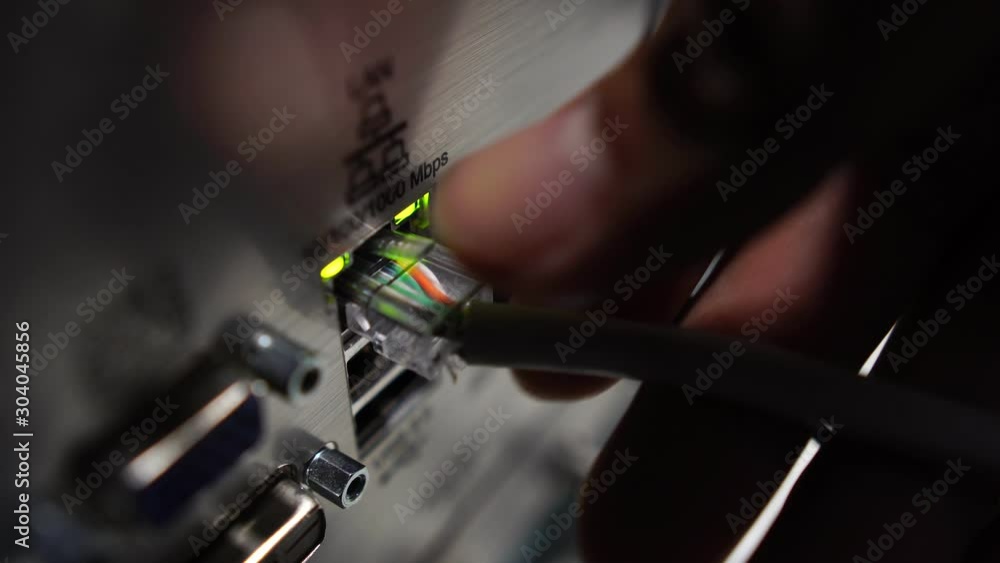 close-up of male engineers are connected to cable systems of communication footage 4K close-up of male engineers are connected to cable systems of communication footage 4K