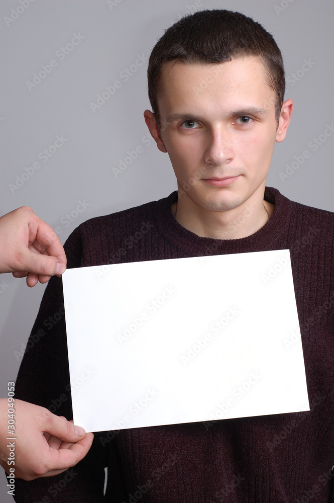 Young man with blank board Young man with blank board