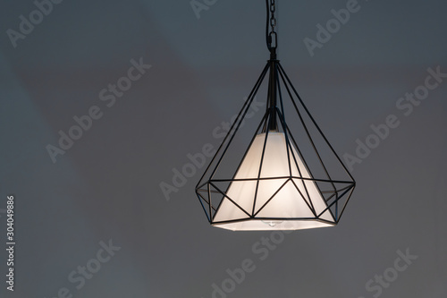 Modern black wire frame ceiling lamp interior lighting bulbs decoration contemporary © pomphotothailand