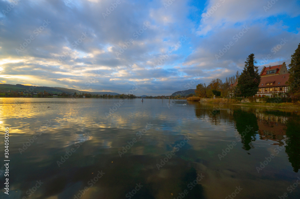 Fototapeta premium On Lake Constance in autumn. Near the castle Oberstaad. whose tower is about 800 years old. On the horizon begins at the Swiss town of Stein am Rhein, the Rhine River its way out of Lake Constance.