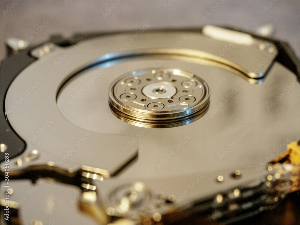 Open hard drive for repair close frame on gray background Open hard drive for repair close frame on gray background