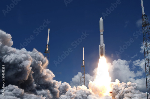 The launch of a space rocket. With smoke and fire. Elements of this image were furnished by NASA.